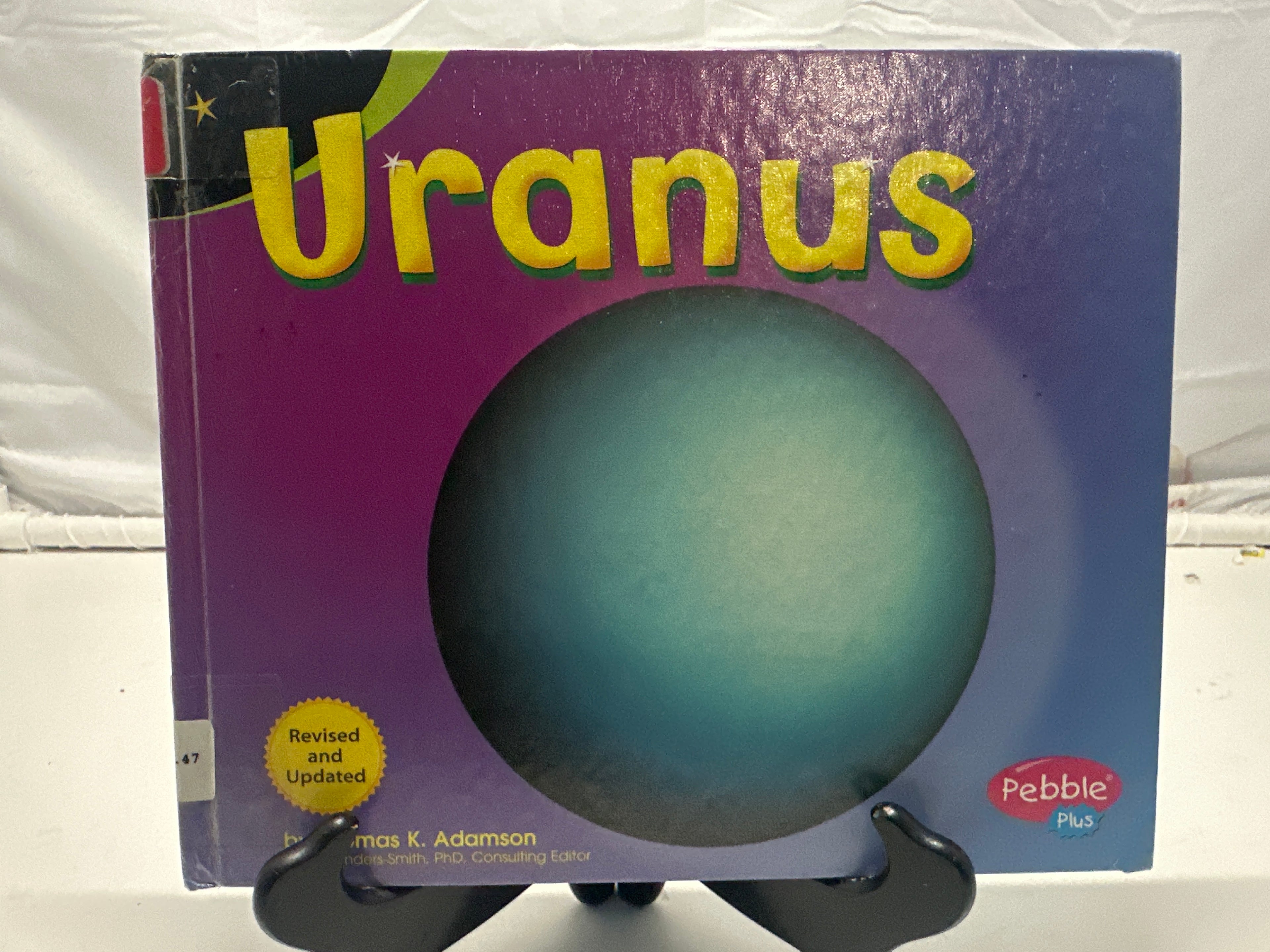 Uranus by Thomas K. Adamson Hardcover Children's Book