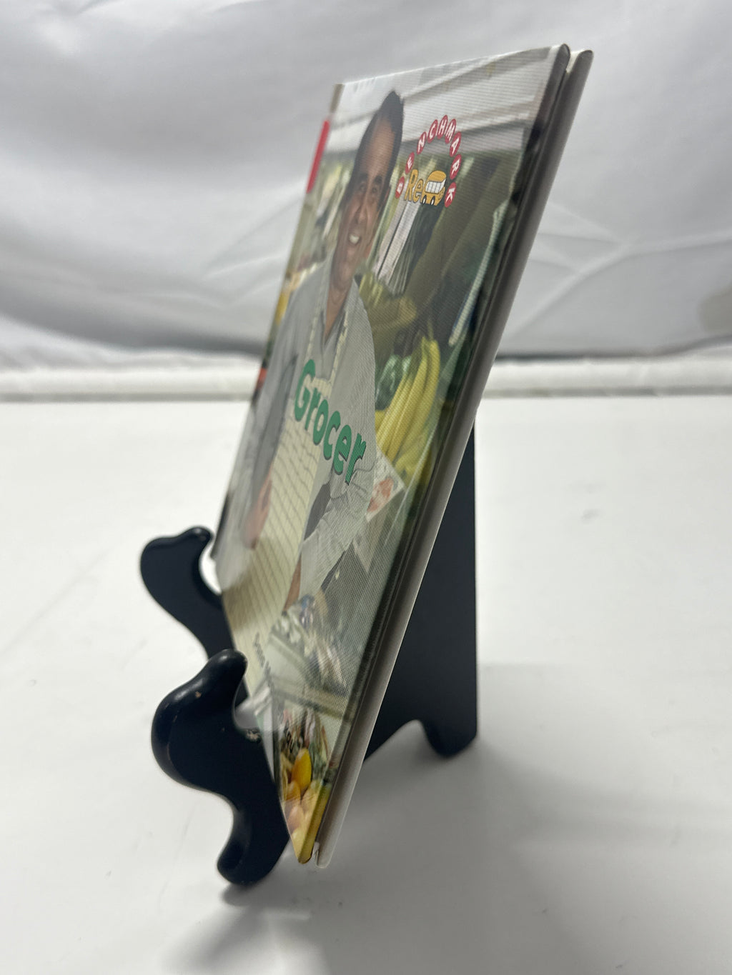 Grocer (Benchmark Rebus) by Dana Meachen Rau Hardcover