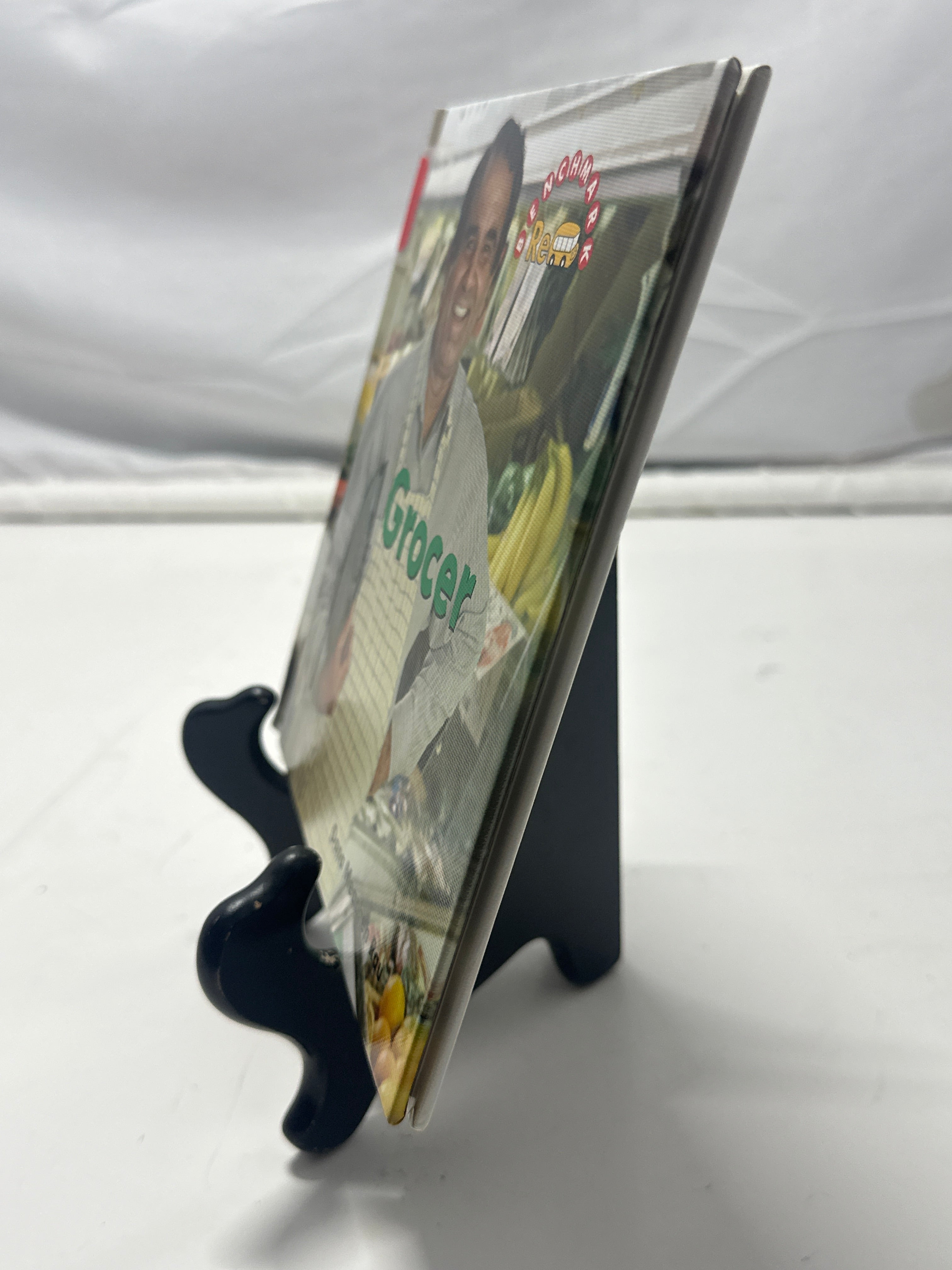 Grocer (Benchmark Rebus) by Dana Meachen Rau Hardcover