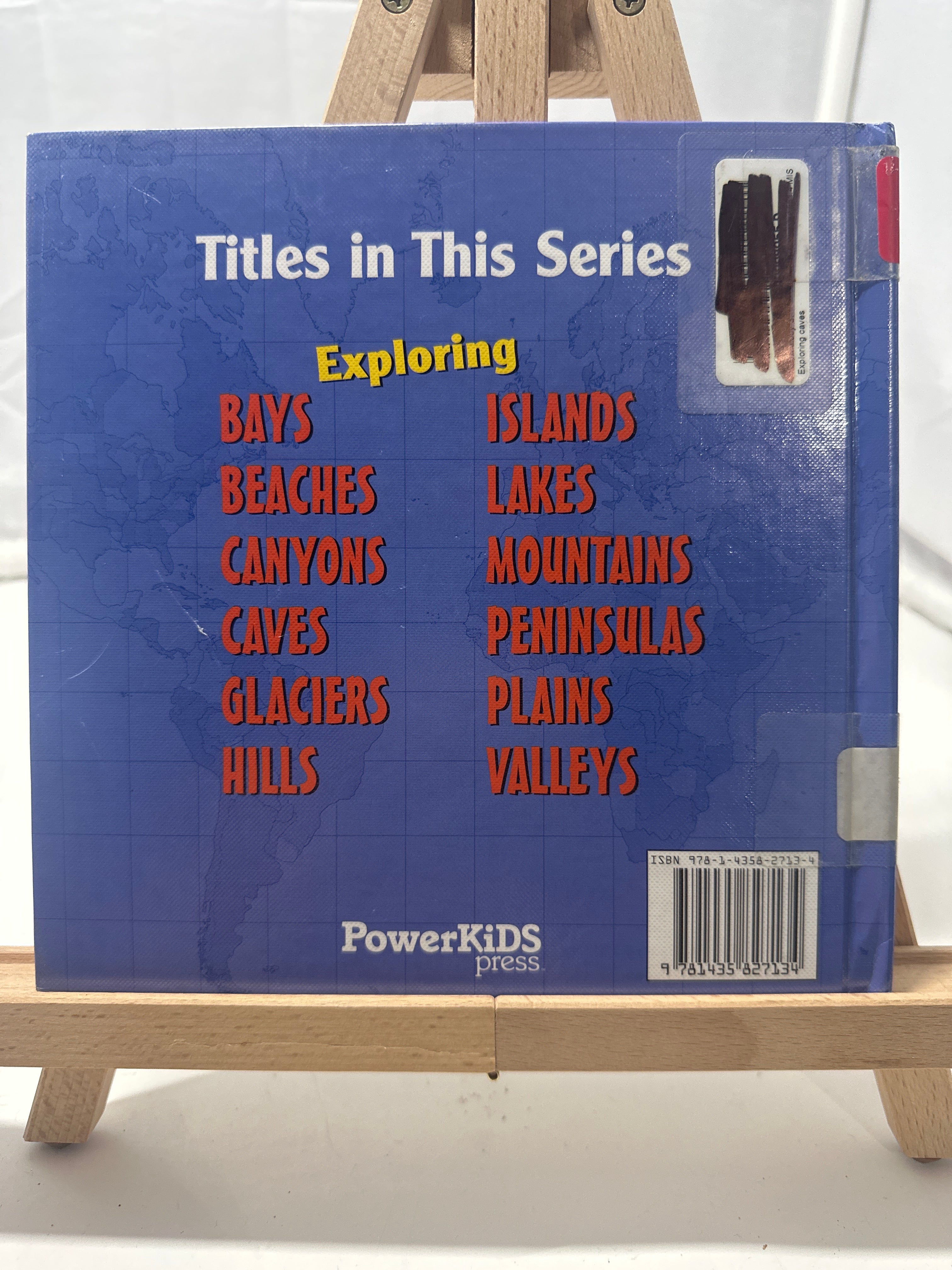 Exploring caves by Melody S. Mis Hardcover Children's Book
