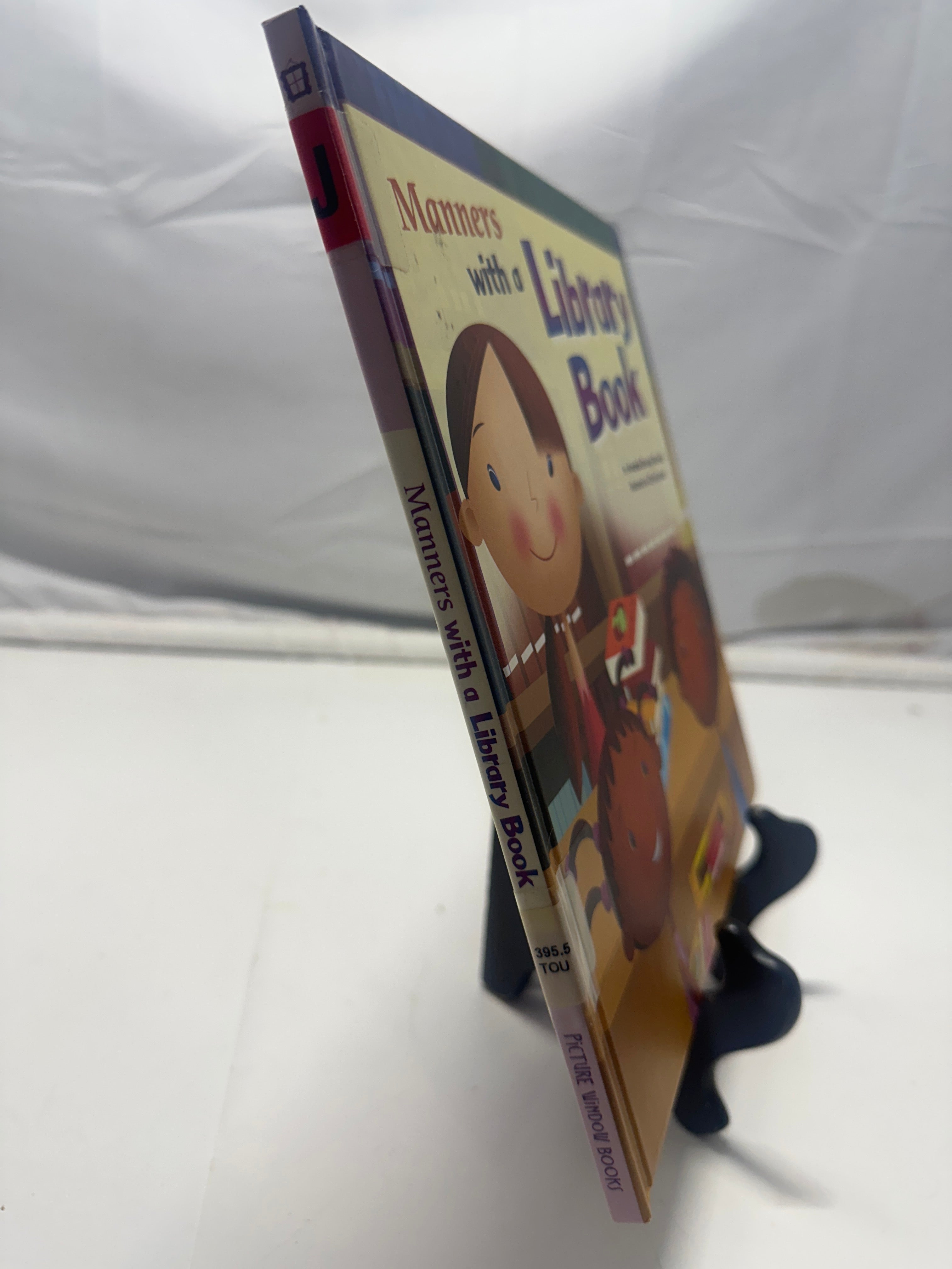 Manners with a library book by Amanda Doering Tourville Hardcover Children's Boo