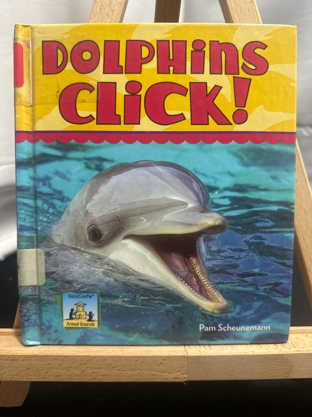 Dolphins click! by Pam Scheunemann Hardcover