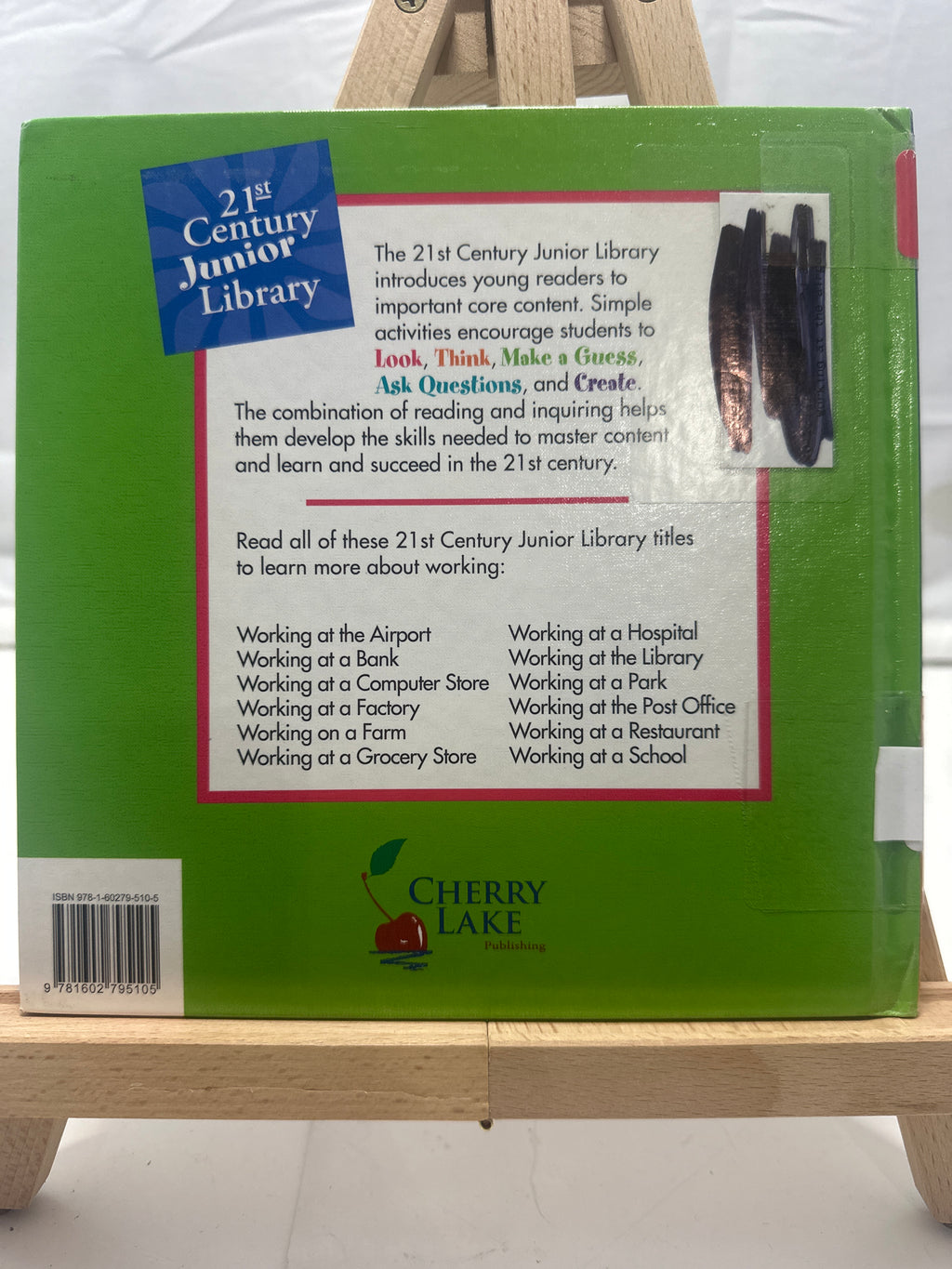 Working at the library by Katie Marsico Hardcover Children's Book
