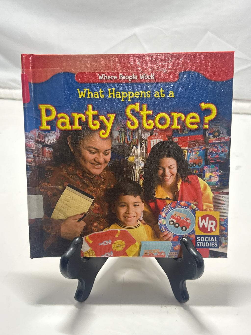 What happens at a party store? by Amy Hutchings Hardcover Children's Book