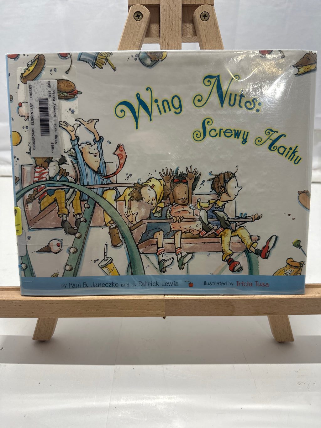 Wing nuts by J. Patrick Lewis Hardcover