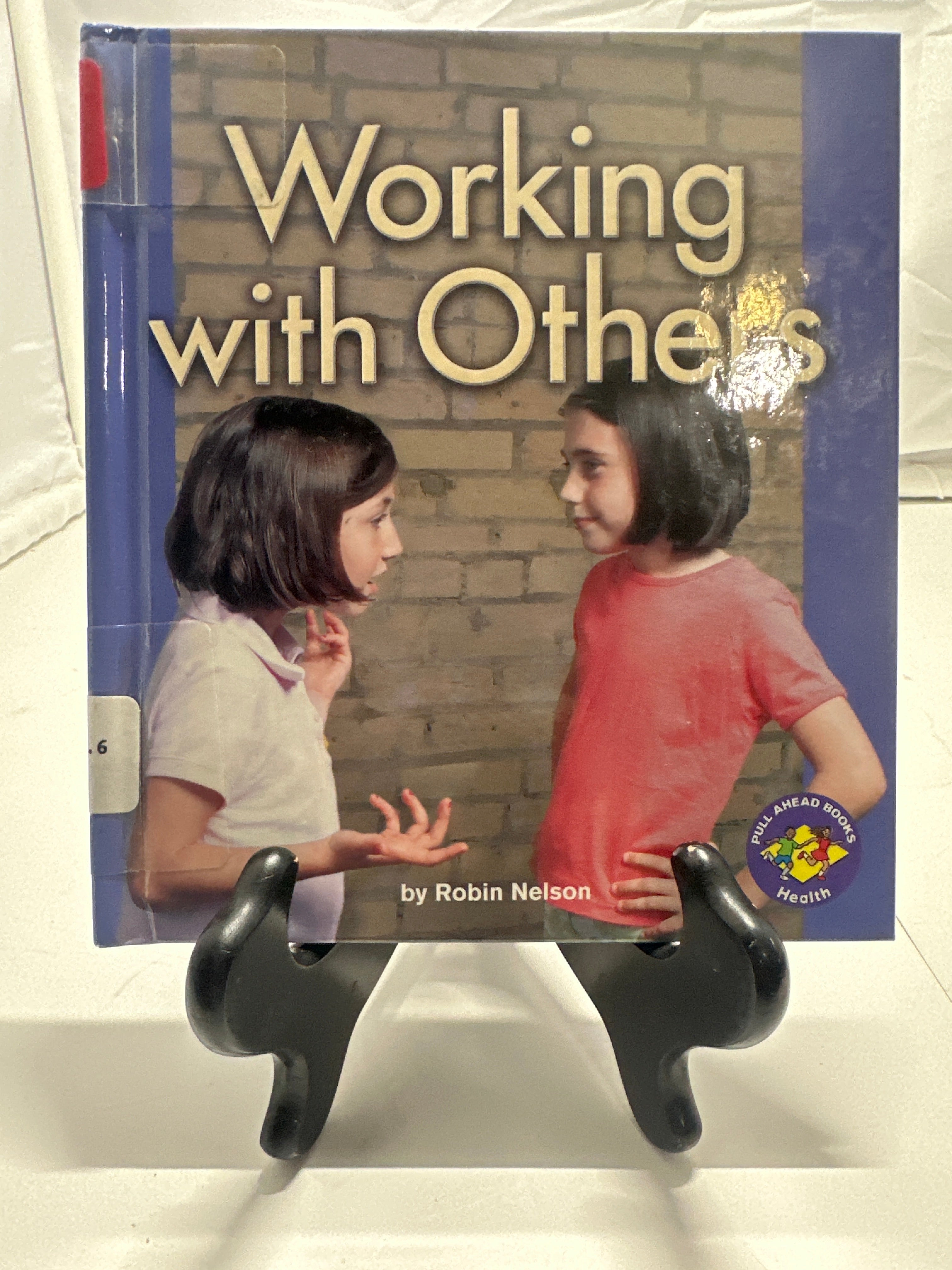 Working with others by Nelson, Robin Hardcover Children's Book