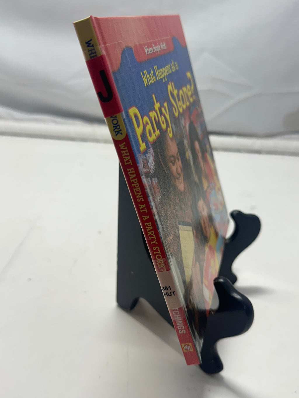 What happens at a party store? by Amy Hutchings Hardcover Children's Book