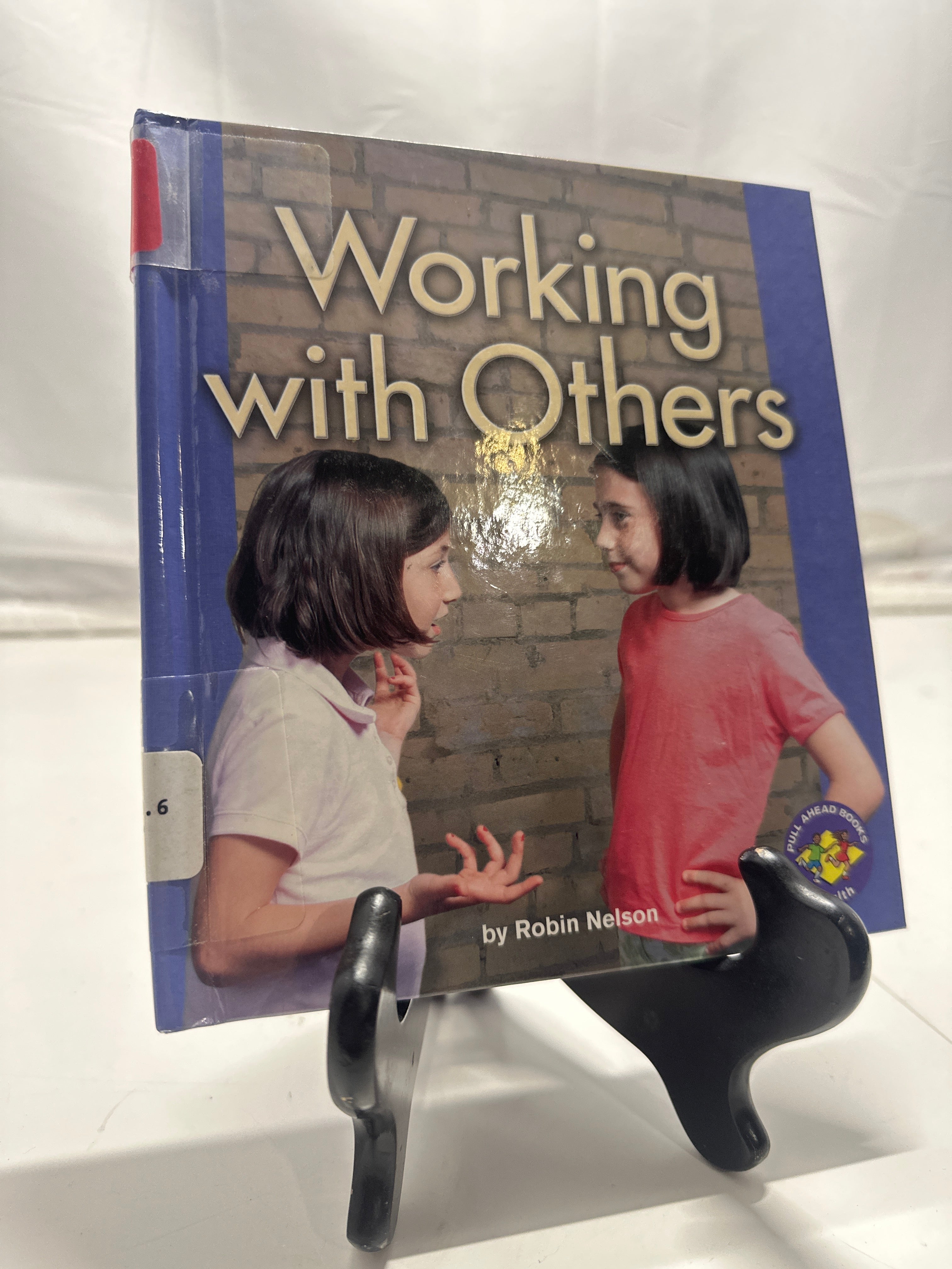 Working with others by Nelson, Robin Hardcover Children's Book