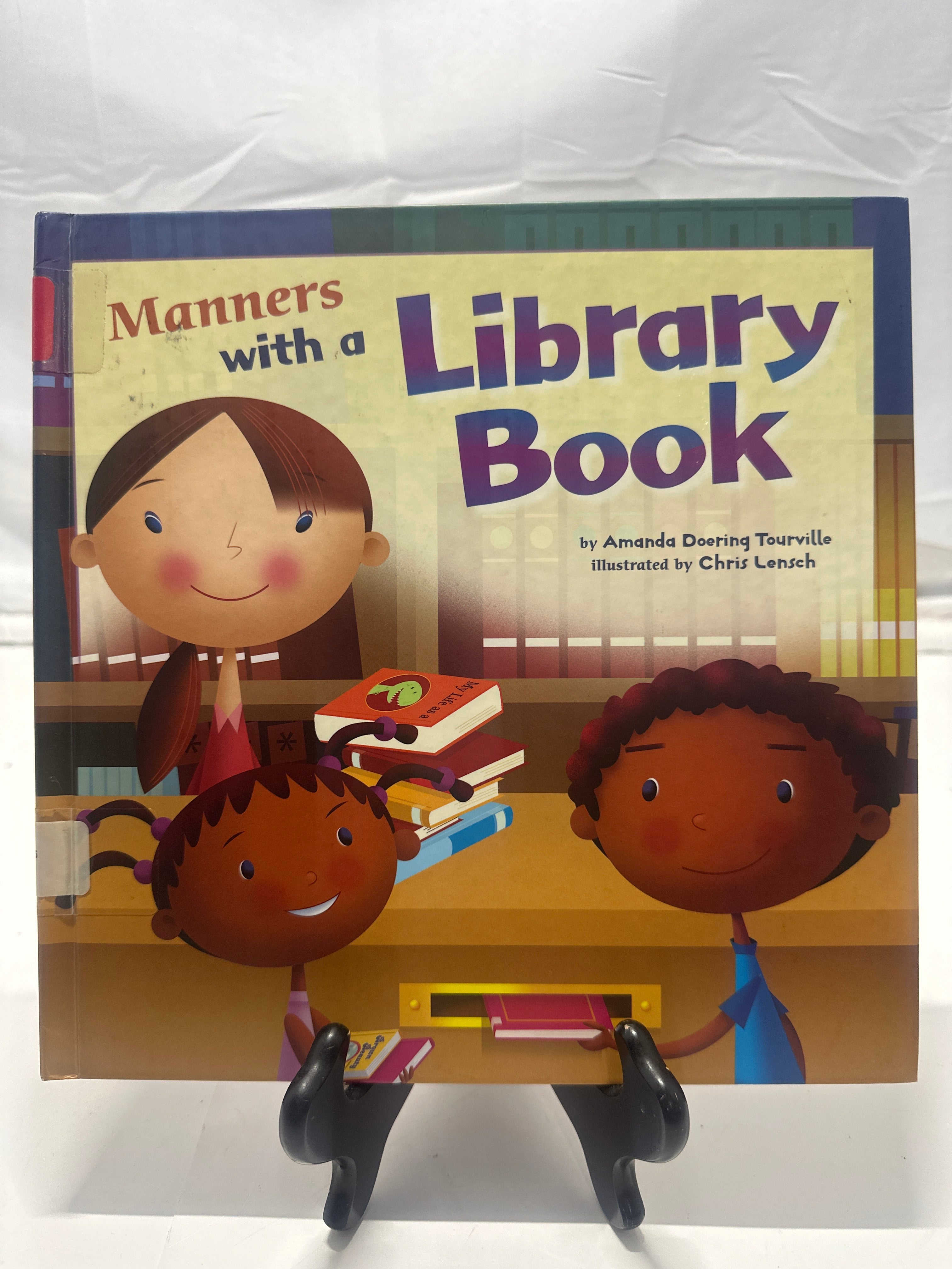 Manners with a library book by Amanda Doering Tourville Hardcover Children's Boo