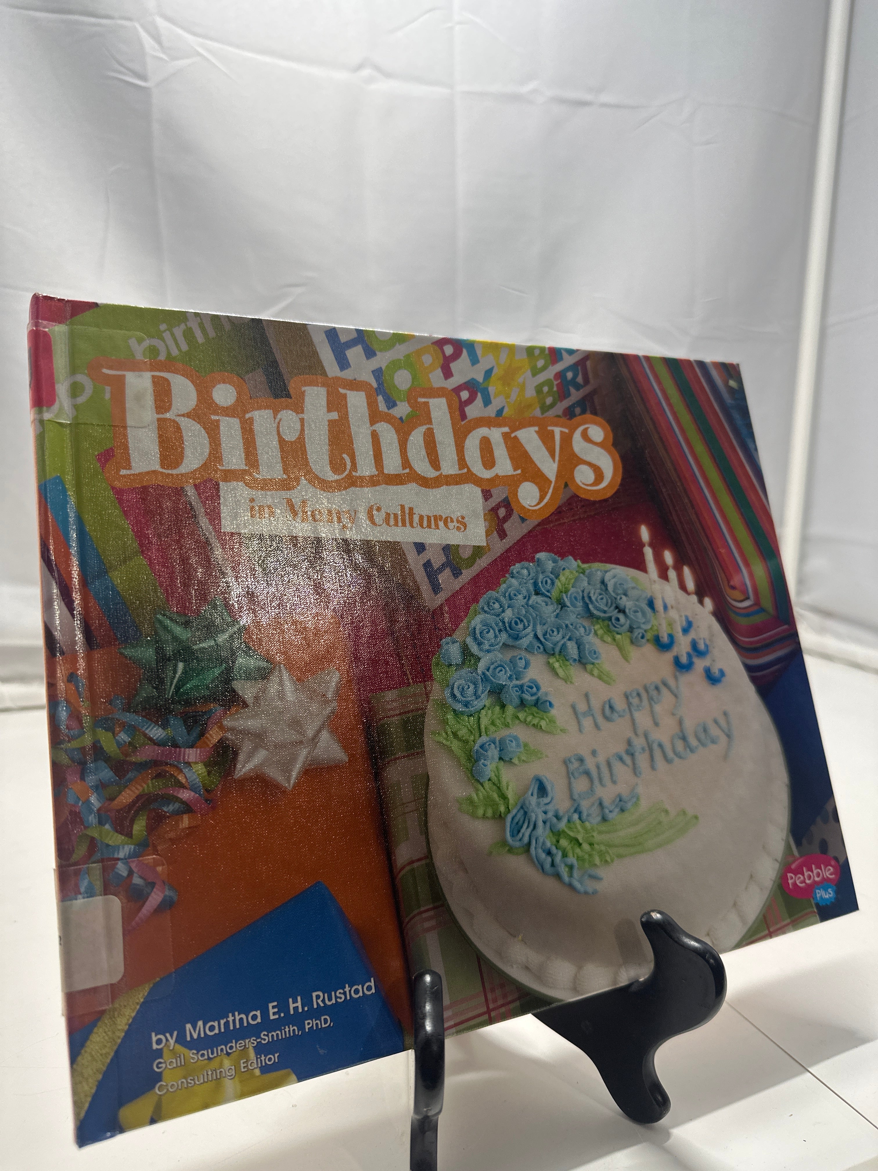 Birthdays in many cultures by Martha E. H. Rustad Hardcover
