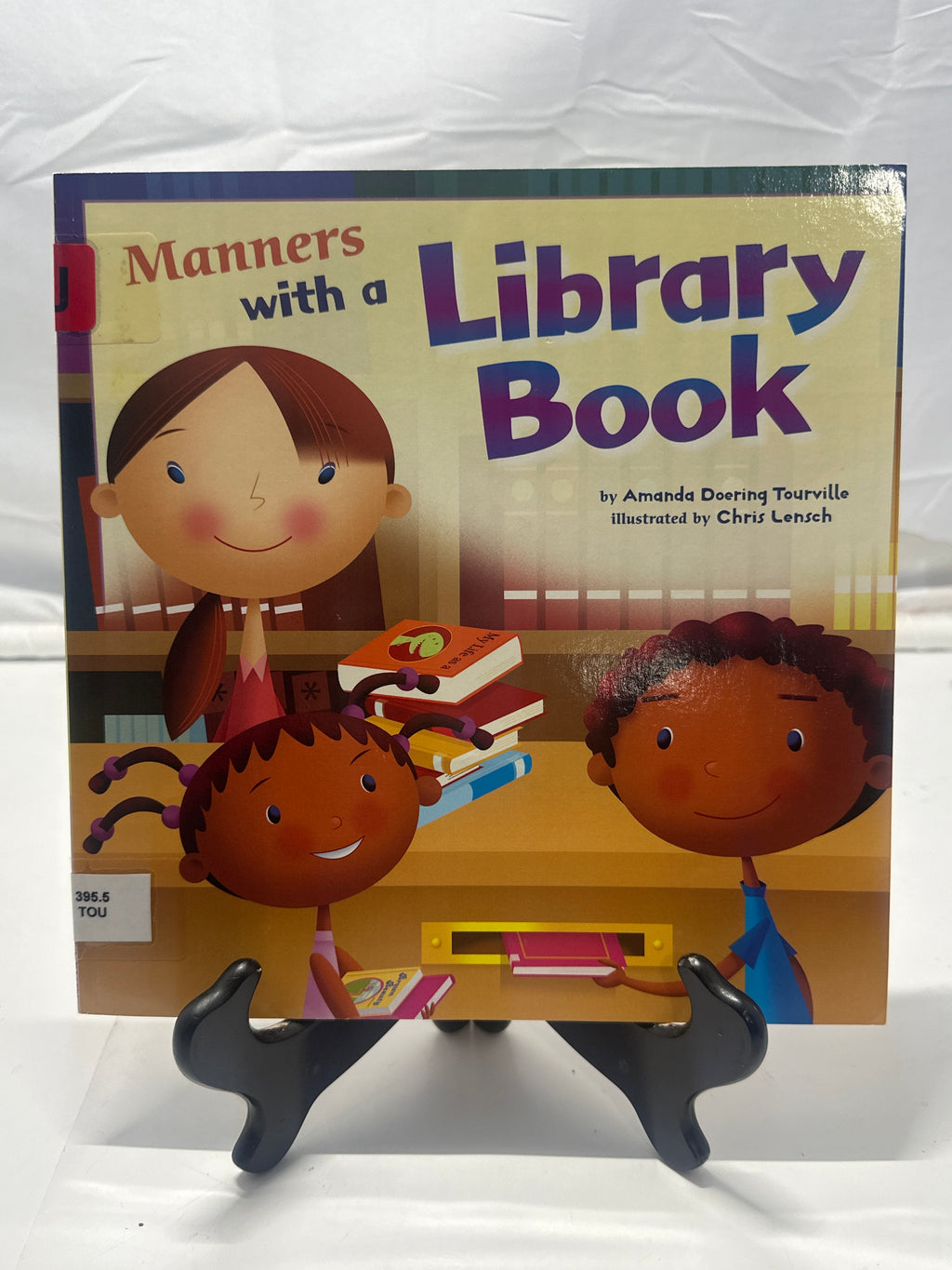 Manners with a Library Book by Amanda Doering Tourville Paperback
