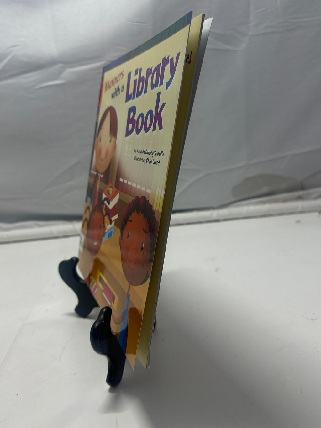 Manners with a Library Book by Amanda Doering Tourville Paperback