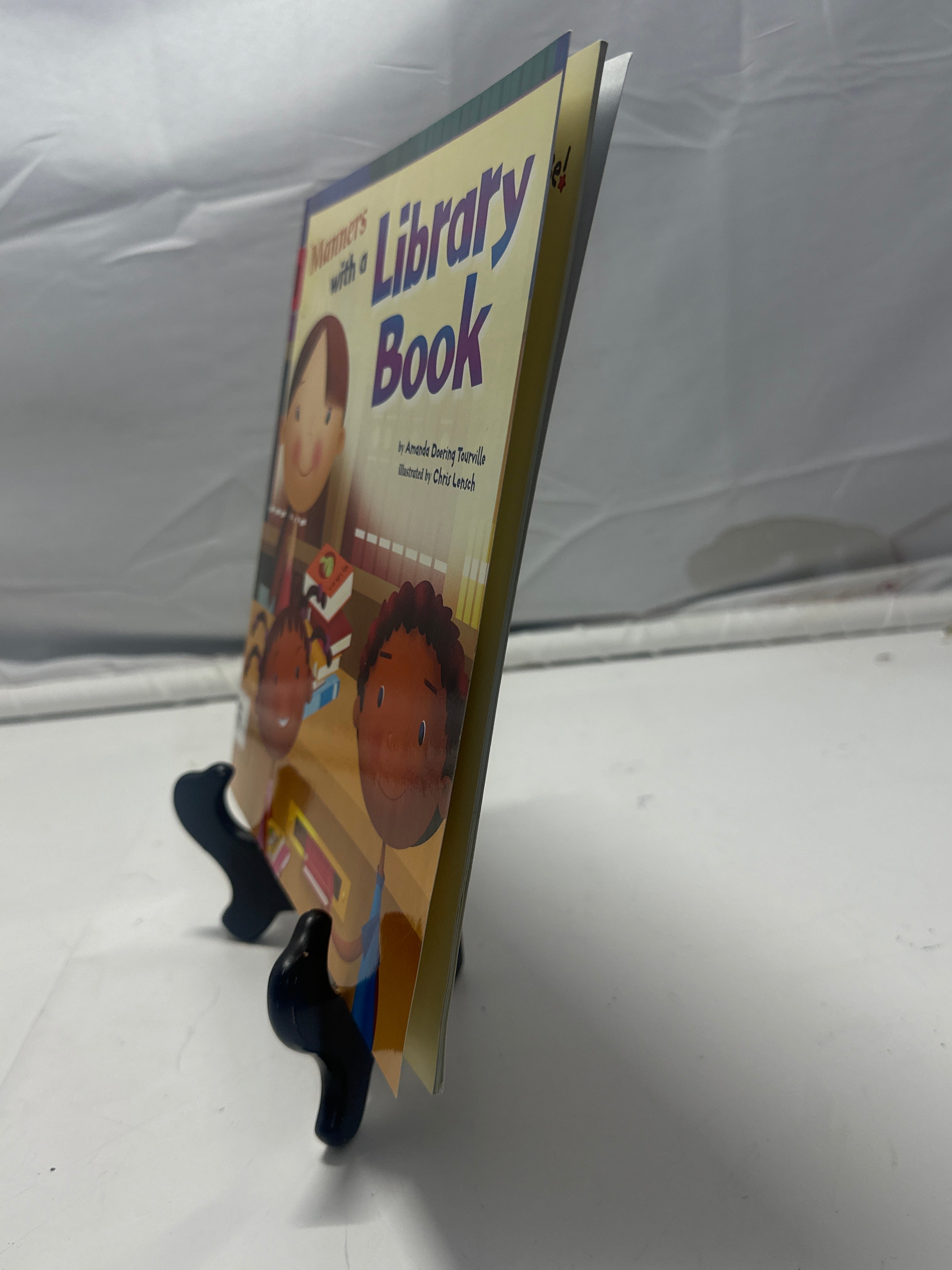 Manners with a Library Book by Amanda Doering Tourville Paperback
