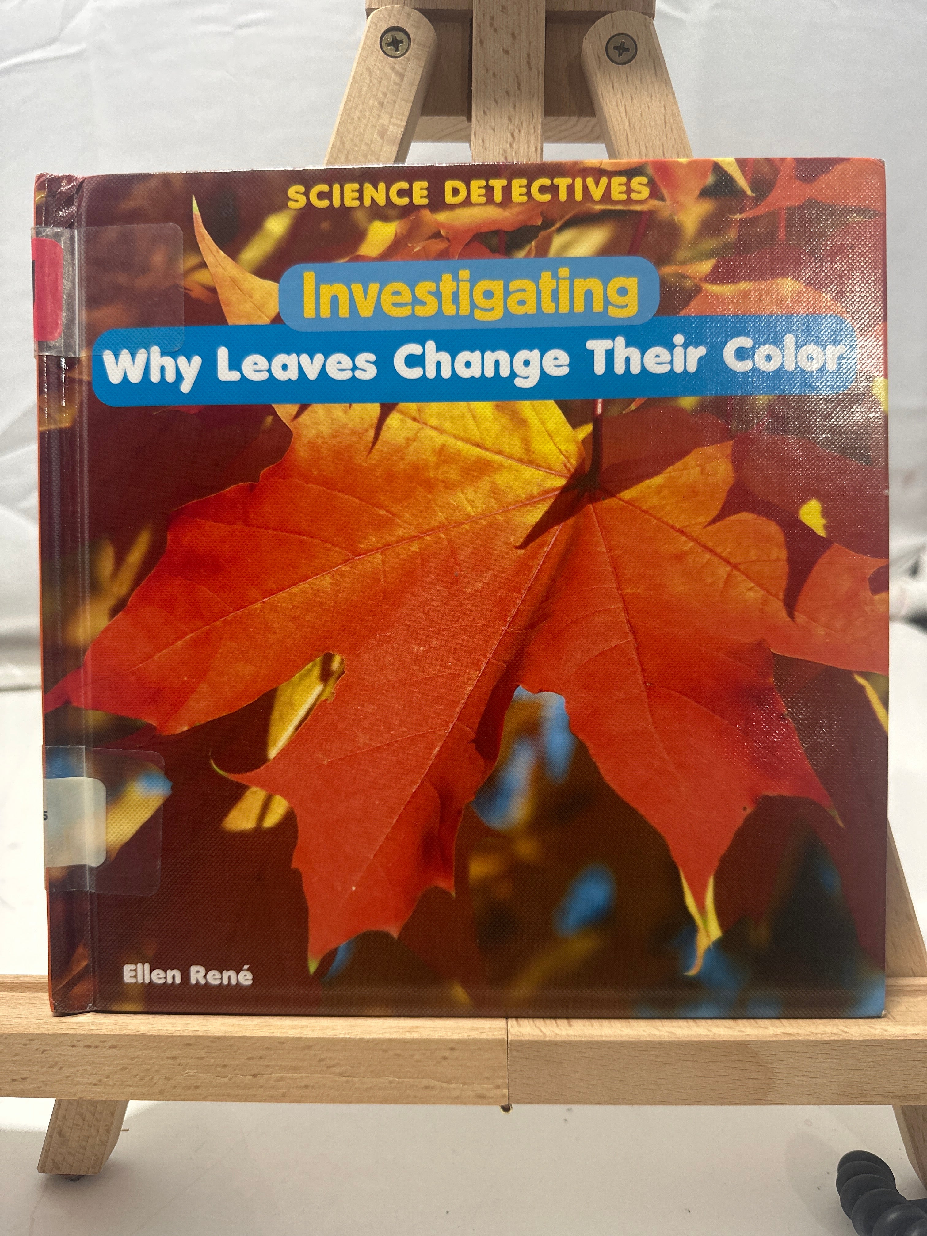Investigating why leaves change their color by Ellen René Hardcover Children's