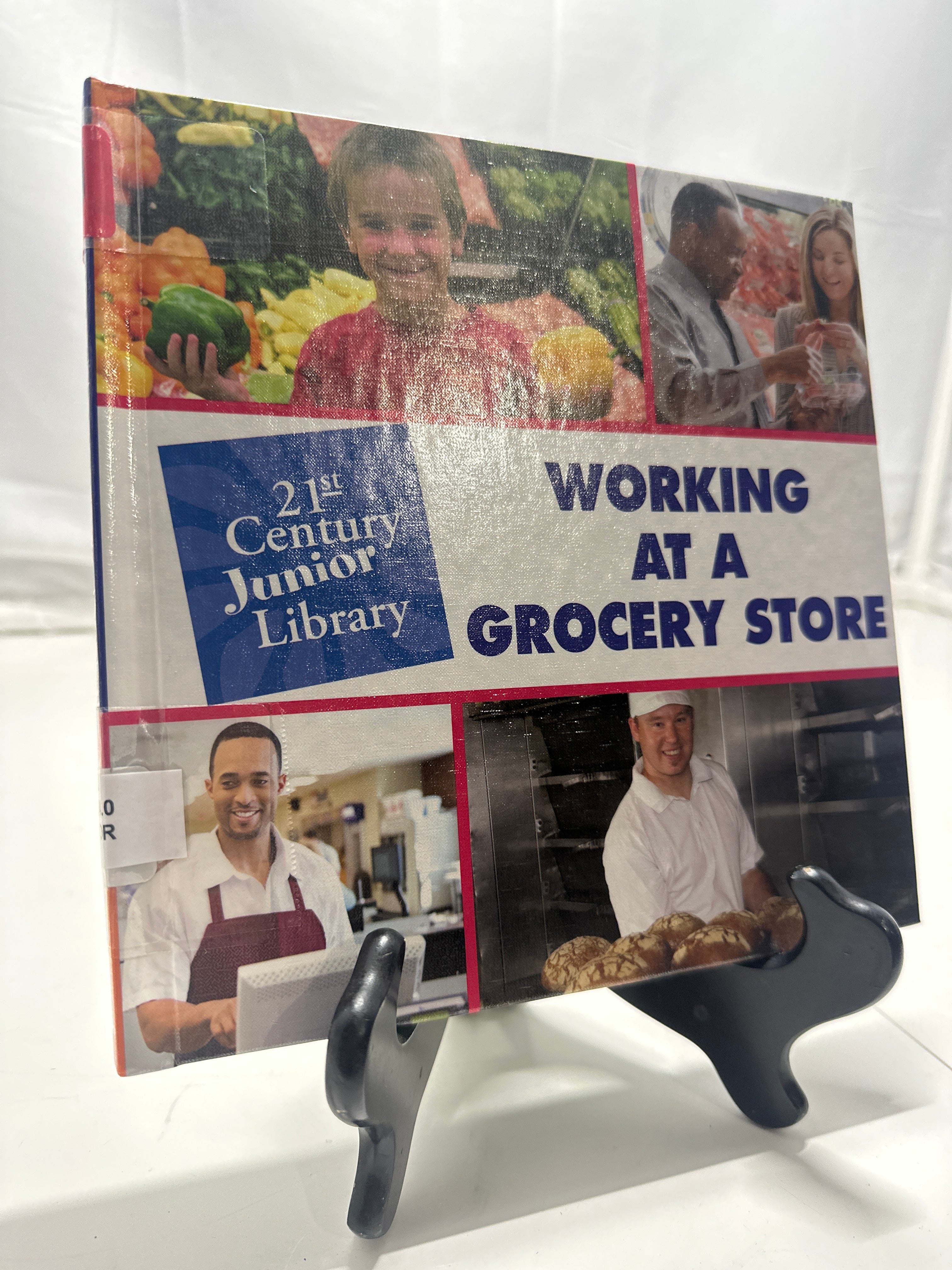 Working in a grocery store by Katie Marsico Hardcover Children's Book