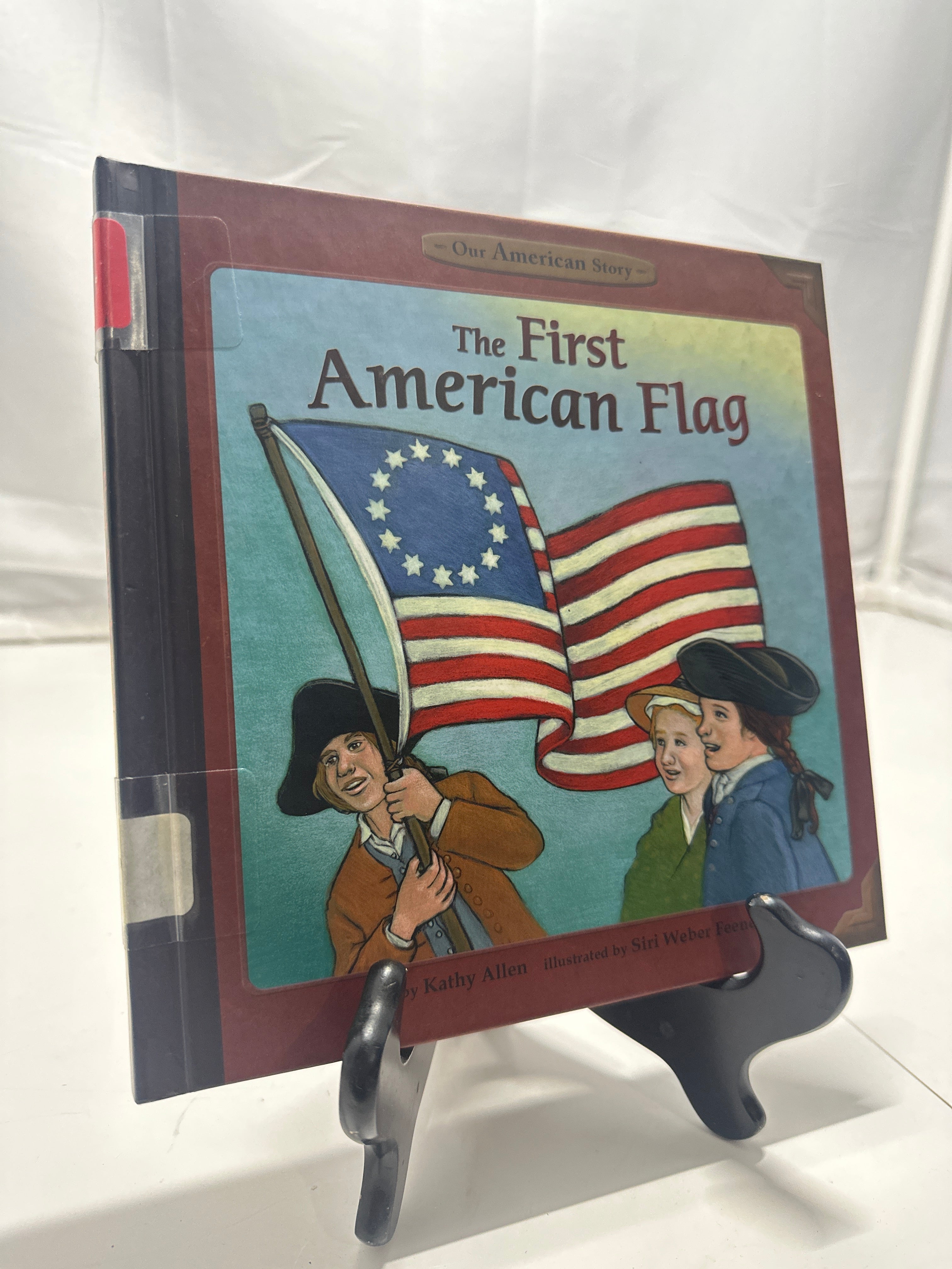 The first American flag by Kathy Allen Hardcover Children's Book