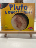 Pluto by Thomas K. Adamson Hardcover