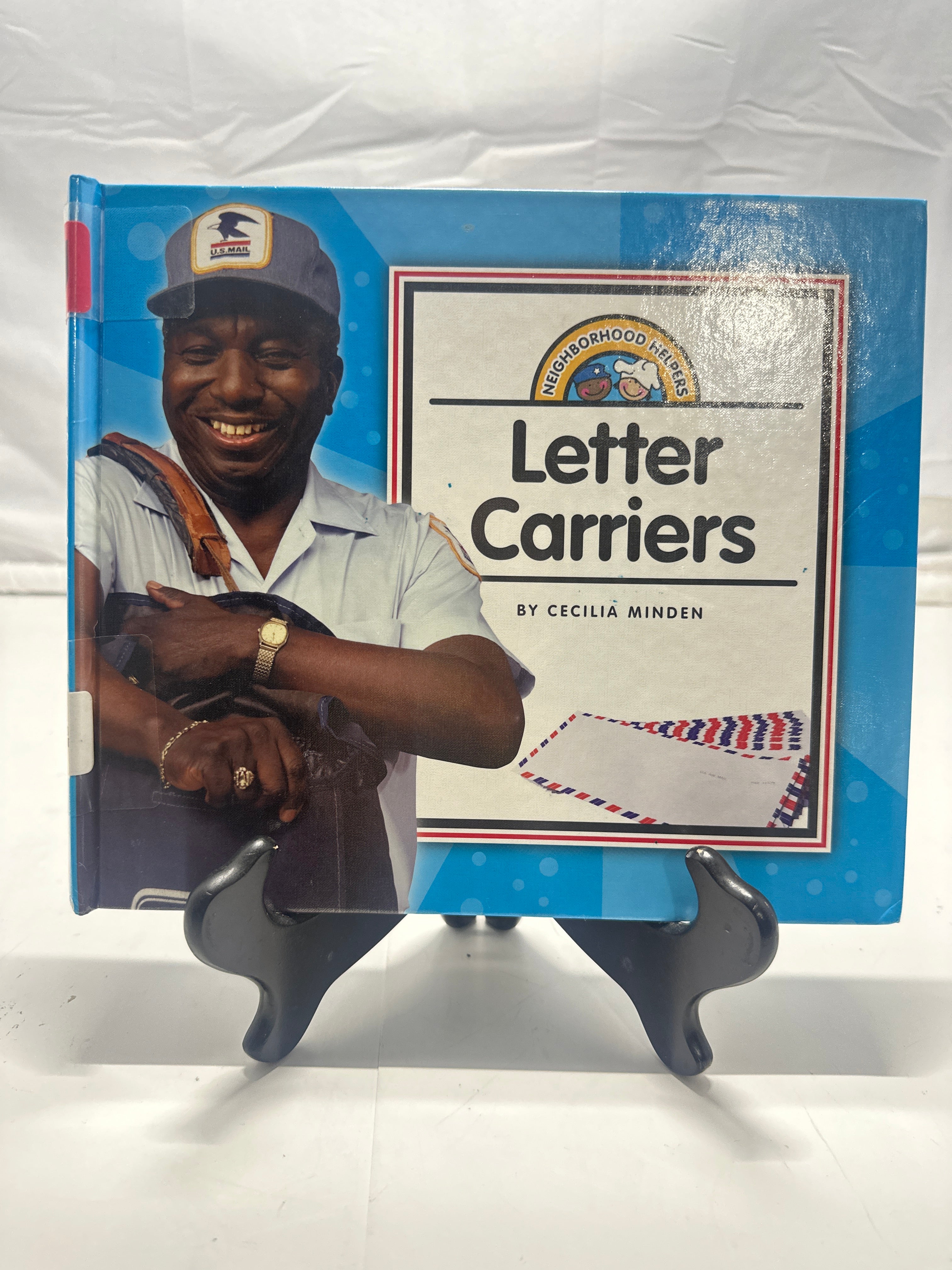 Letter carriers by Cecilia Minden Hardcover Children's Book