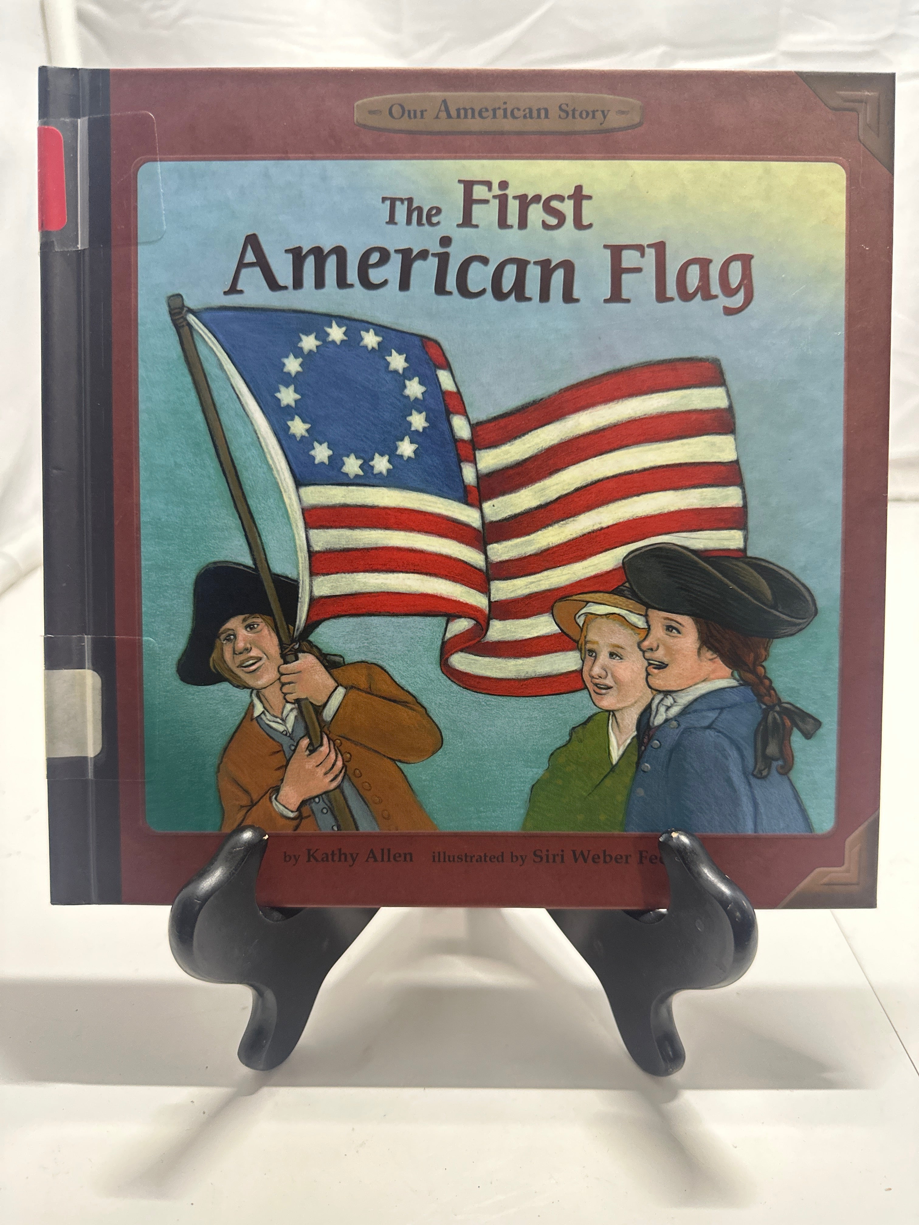 The first American flag by Kathy Allen Hardcover Children's Book