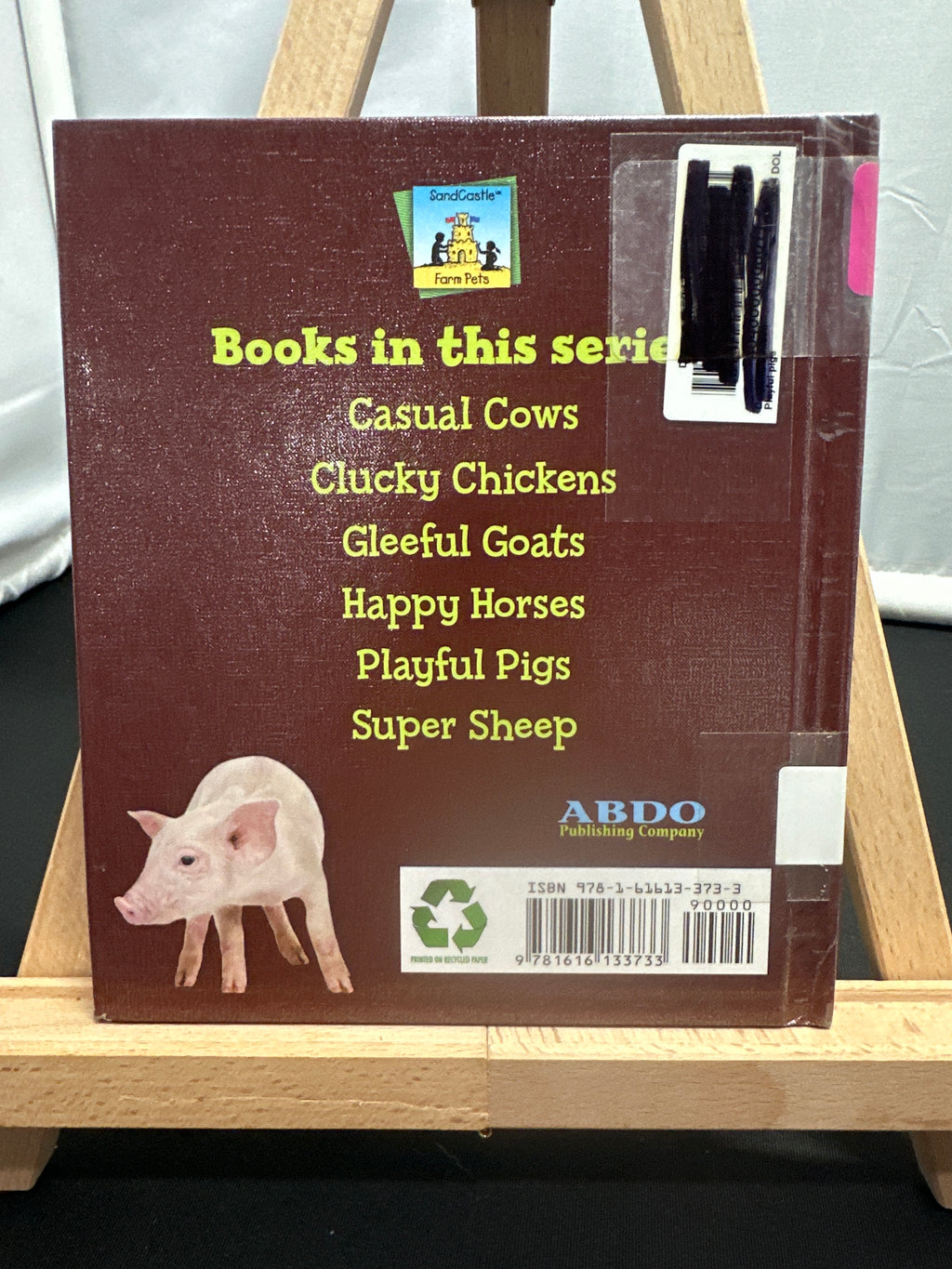 Playful pigs by Colleen Dolphin Hardcover Children's Book