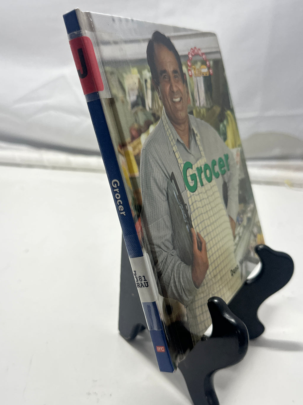 Grocer (Benchmark Rebus) by Dana Meachen Rau Hardcover