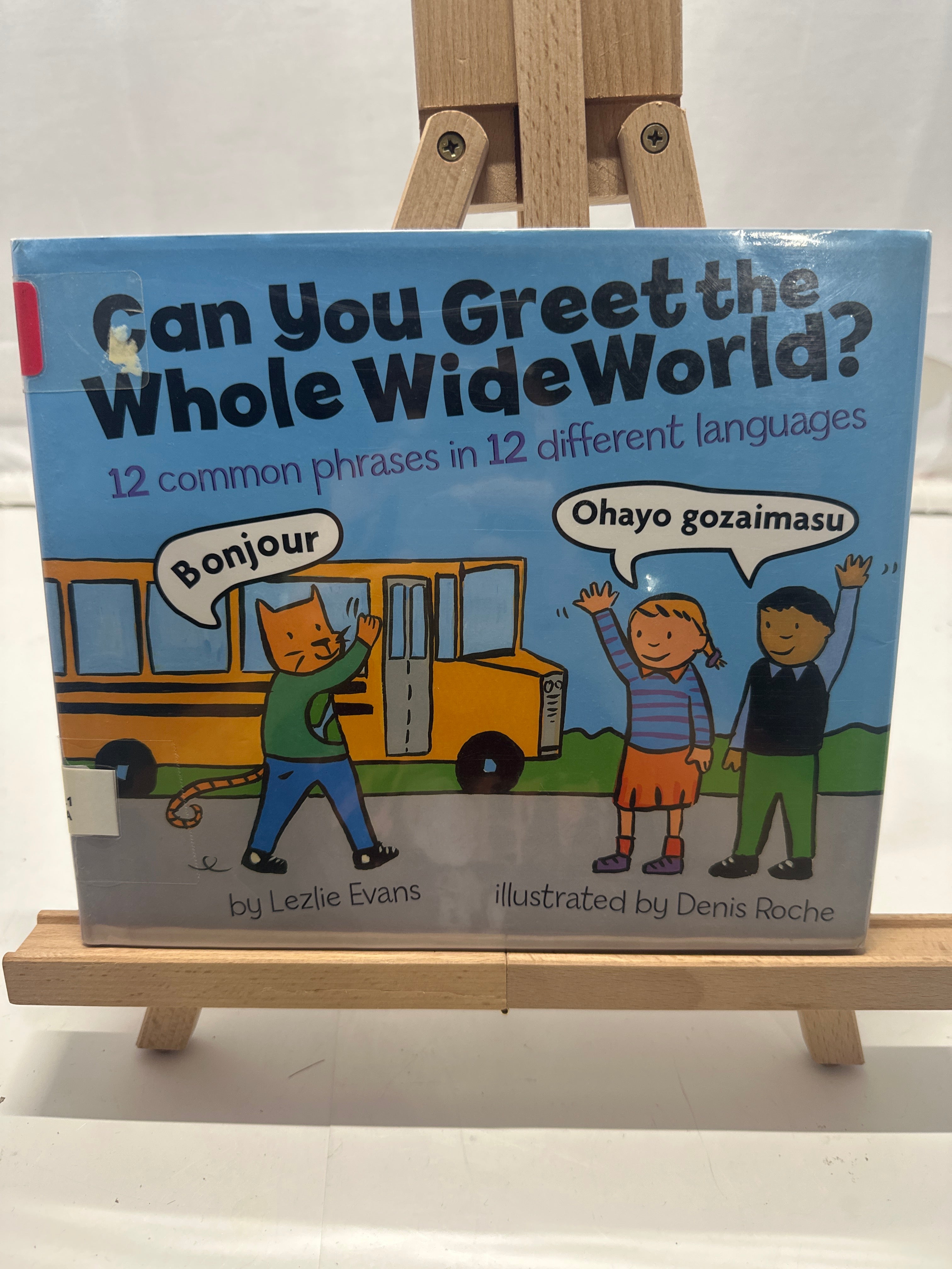 Can you greet the whole wide world? by Lezlie Evans Hardcover Children's Book