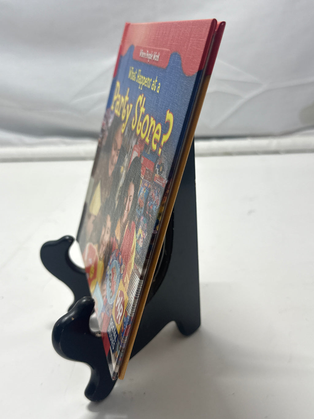 What happens at a party store? by Amy Hutchings Hardcover Children's Book